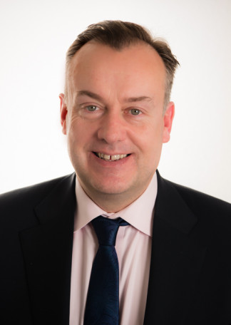 John McManus, Executive Director, Head of Sales, The Americas, U.K. & Ireland, SIX Financial Information